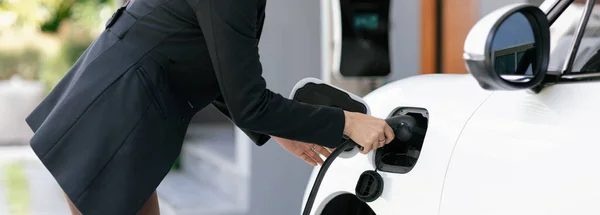 Closeup Progressive Woman Install Cable Plug Her Electric Car Home — Stock Photo, Image