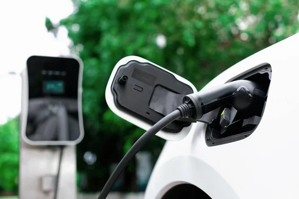 Focus Closeup Electric Vehicle Plugged Charger Device Blurred Background Public — Stok fotoğraf