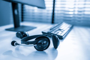 Essential equipment concept for competent online operators, call service agents, or online working. Customer service equipment, as well as helpdesk tools.