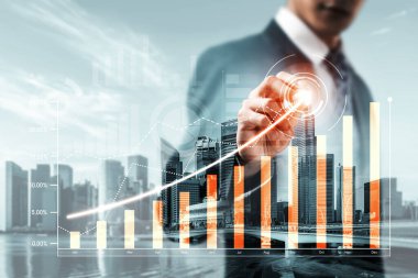Businessman analyst working with digital finance business data graph showing technology of investment strategy for perceptive financial business decision. Digital economic analysis technology concept.