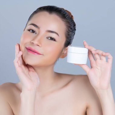 Glamorous beautiful perfect cosmetic skin with soft makeup woman portrait hold mockup jar cream or moisturizer for skincare treatment and anti-aging product advertisement in isolated background.