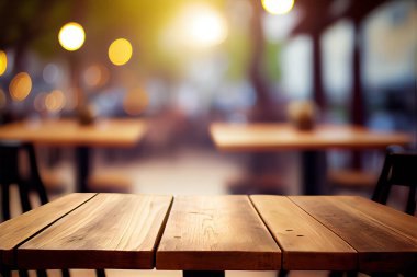 Empty wood table for product display in blur background of admirable restaurant at night