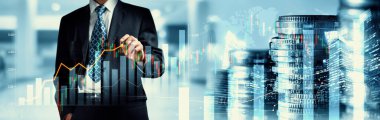 Businessman analyst working with digital finance business data graph showing technology of investment strategy for perceptive financial business decision. Digital economic analysis technology concept.