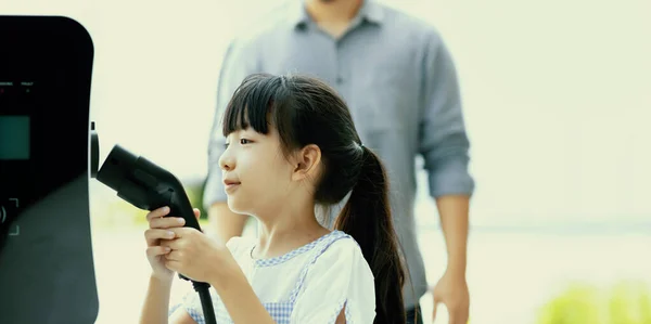 Focus Progressive Young Girl Holding Charger Device Home Electric Charging — Fotografia de Stock