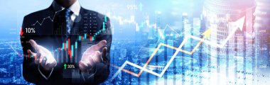 Businessman analyst working with digital finance business data graph showing technology of investment strategy for perceptive financial business decision. Digital economic analysis technology concept.