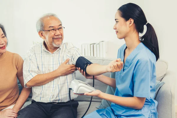 Elderly Man Having Blood Pressure Check His Personal Caregiver His — Foto de Stock