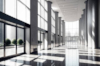 Blur background of empty entrance hall of modern public station or large convention center lobby . Contemporary beautiful office hallway with bright and clean composition