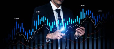 Businessman analyst working with digital finance business data graph showing technology of investment strategy for perceptive financial business decision. Digital economic analysis technology concept.