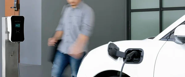 Focus Electric Car Charging Home Charging Station Blurred Progressive Man — Stock Fotó