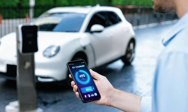 Closeup Progressive Businessman Look Cars Battery Status Application Smart Phone — Stock Fotó