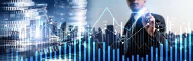 Businessman analyst working with digital finance business data graph showing technology of investment strategy for perceptive financial business decision. Digital economic analysis technology concept.