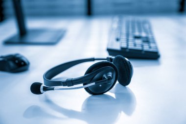 Essential equipment concept for competent online operators, call service agents, or online working. Customer service equipment, as well as helpdesk tools.