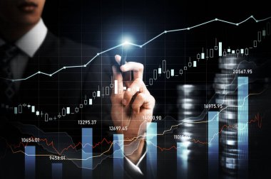 Businessman analyst working with digital finance business data graph showing technology of investment strategy for perceptive financial business decision. Digital economic analysis technology concept.