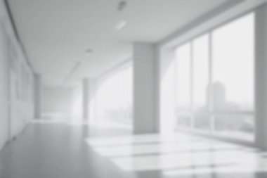 Blur background of empty modern office background . Workspace interior design white color . Clean and bright office gallery background