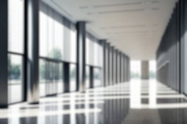 Blur background of empty entrance hall of modern public station or large convention center lobby . Contemporary beautiful office hallway with bright and clean composition