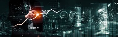 Businessman analyst working with digital finance business data graph showing technology of investment strategy for perceptive financial business decision. Digital economic analysis technology concept.