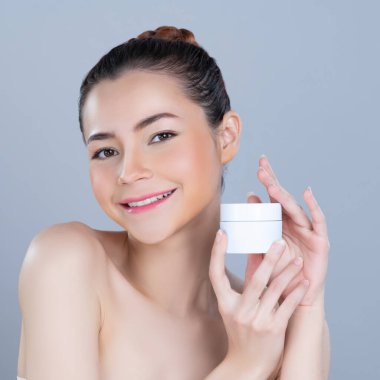 Glamorous beautiful perfect cosmetic skin with soft makeup woman portrait hold mockup jar cream or moisturizer for skincare treatment and anti-aging product advertisement in isolated background.