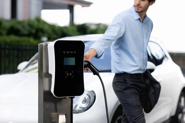Progressive Businessman Insert Charger Plug Charging Station His Electric Vehicle — Stock Photo, Image