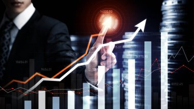 Businessman analyst working with digital finance business data graph showing technology of investment strategy for perceptive financial business decision. Digital economic analysis technology concept.