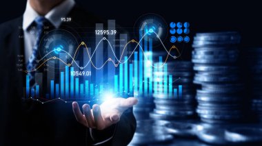 Businessman analyst working with digital finance business data graph showing technology of investment strategy for perceptive financial business decision. Digital economic analysis technology concept.