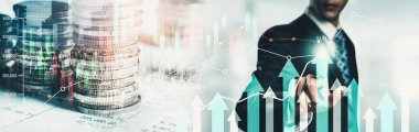 Businessman analyst working with digital finance business data graph showing technology of investment strategy for perceptive financial business decision. Digital economic analysis technology concept.