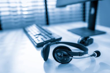 Essential equipment concept for competent online operators, call service agents, or online working. Customer service equipment, as well as helpdesk tools.