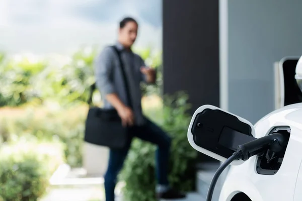 Focus Electric Car Charging Home Charging Station Blurred Progressive Man — Stock Photo, Image