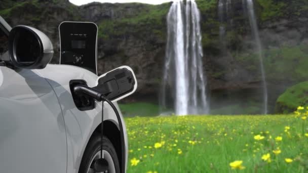 Electric Car Charging Energy Charging Station Natural Scenery Waterfall Stream — Stock Video