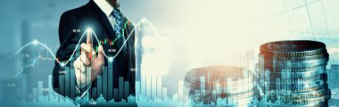 Businessman analyst working with digital finance business data graph showing technology of investment strategy for perceptive financial business decision. Digital economic analysis technology concept.
