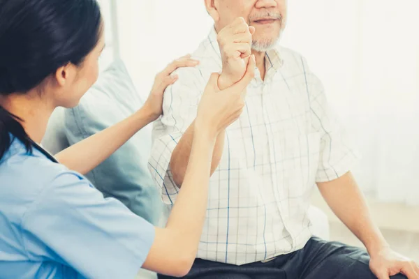 Caring Young Female Doctor Performing Osteopathy Treatment Contented Senior Patient — Foto Stock