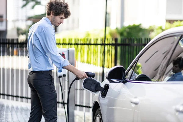 Progressive Businessman Insert Charger Plug Charging Station His Electric Vehicle — Stok fotoğraf
