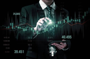 Businessman analyst working with digital finance business data graph showing technology of investment strategy for perceptive financial business decision. Digital economic analysis technology concept.