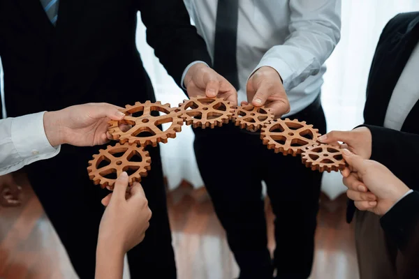 Closeup Hand Holding Wooden Gear Businesspeople Wearing Suit Harmony Synergy — Stok fotoğraf