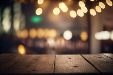 Empty wood table for product display in blur background of admirable restaurant at night