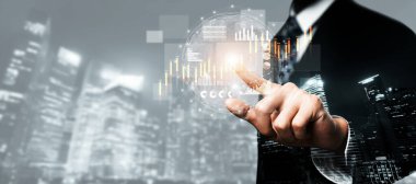 Businessman analyst working with digital finance business data graph showing technology of investment strategy for perceptive financial business decision. Digital economic analysis technology concept.