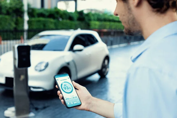 Closeup Progressive Businessman Look Cars Battery Status Application Smart Phone — 图库照片