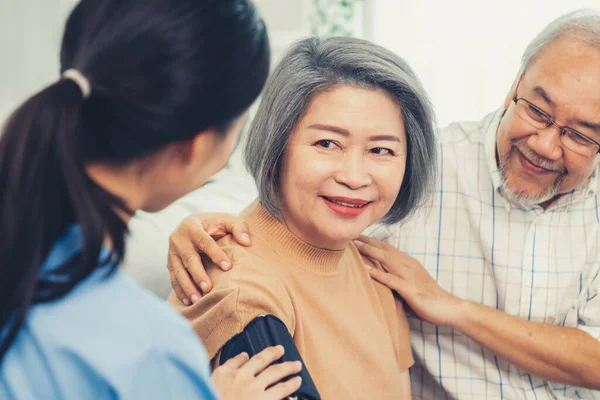 Elderly Woman Contented Life Having Blood Pressure Check Her Caregiver —  Fotos de Stock
