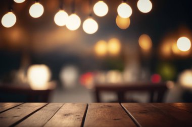 Empty wood table for product display in blur background of admirable restaurant at night