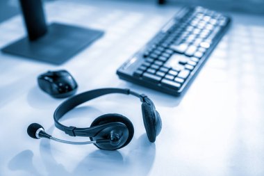 Essential equipment concept for competent online operators, call service agents, or online working. Customer service equipment, as well as helpdesk tools.