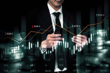 Businessman analyst working with digital finance business data graph showing technology of investment strategy for perceptive financial business decision. Digital economic analysis technology concept.