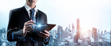 Businessman analyst working with digital finance business data graph showing technology of investment strategy for perceptive financial business decision. Digital economic analysis technology concept.