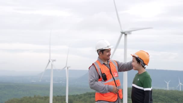 Engineer His Son Wind Farm Atop Hill Mountain Rural Progressive — Stock Video