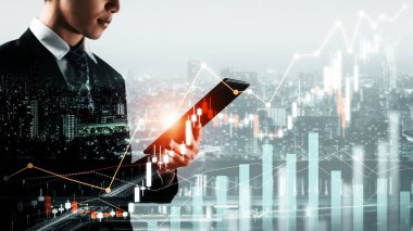 Businessman analyst working with digital finance business data graph showing technology of investment strategy for perceptive financial business decision. Digital economic analysis technology concept.