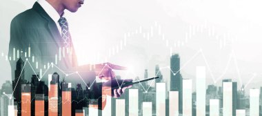 Businessman analyst working with digital finance business data graph showing technology of investment strategy for perceptive financial business decision. Digital economic analysis technology concept.