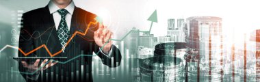 Businessman analyst working with digital finance business data graph showing technology of investment strategy for perceptive financial business decision. Digital economic analysis technology concept.