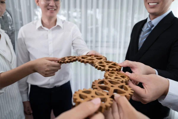 Closeup Hand Holding Wooden Gear Businesspeople Wearing Suit Harmony Synergy — Stok fotoğraf