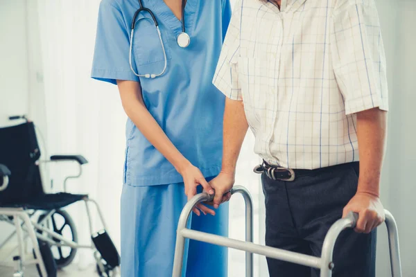 Physiotherapist Assists Her Contented Senior Patient Folding Walker Recuperation Elderly — Stock Photo, Image