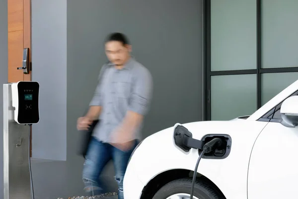 Focus Electric Car Charging Home Charging Station Blurred Progressive Man — Stockfoto