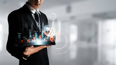 Businessman analyst working with digital finance business data graph showing technology of investment strategy for perceptive financial business decision. Digital economic analysis technology concept.