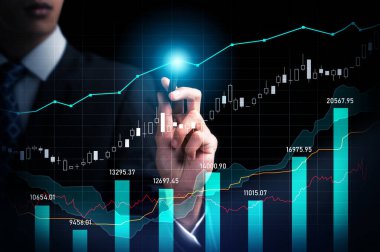 Businessman analyst working with digital finance business data graph showing technology of investment strategy for perceptive financial business decision. Digital economic analysis technology concept.